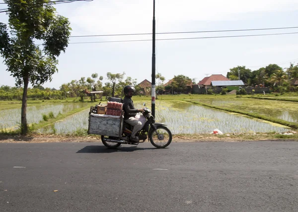 Goods transported on a scooter in Bali, Indonesia