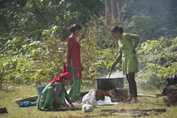 Taru women cooking in Nepal
