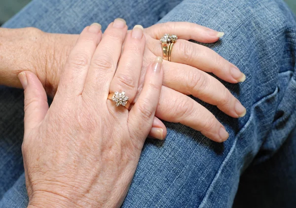 Diamond rings on married seniors hands