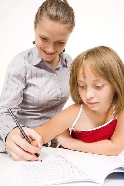 Little girl learning to write