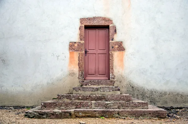 Old doors with steps