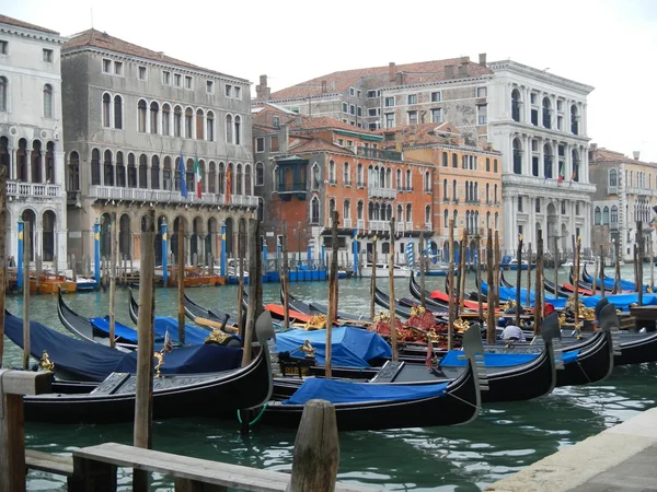 Covered Gondolas line Grand Canal on Winter\'s Day