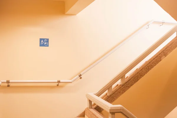 Tsunami escape stairwell behind a tall building