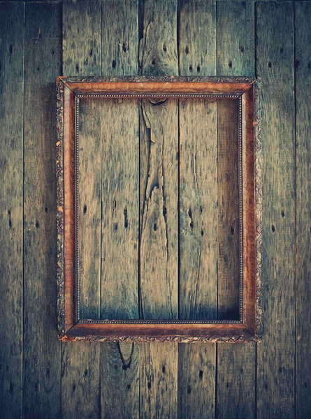 Old Vintage Frame on the wooden wall