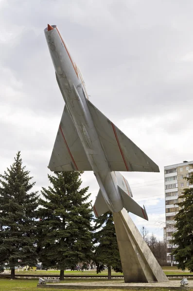 Old aircraft MiG-21 monument on city street