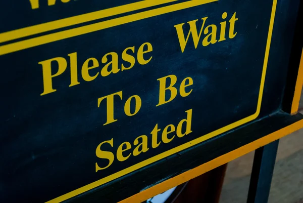 Please Wait To Be Seated Sign
