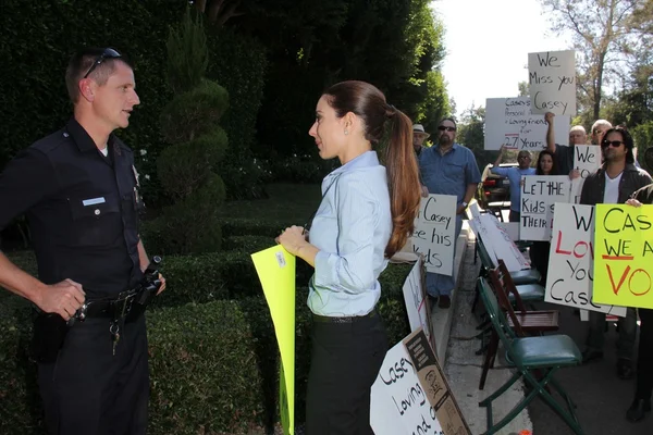 Kerri Kasem talks to the police