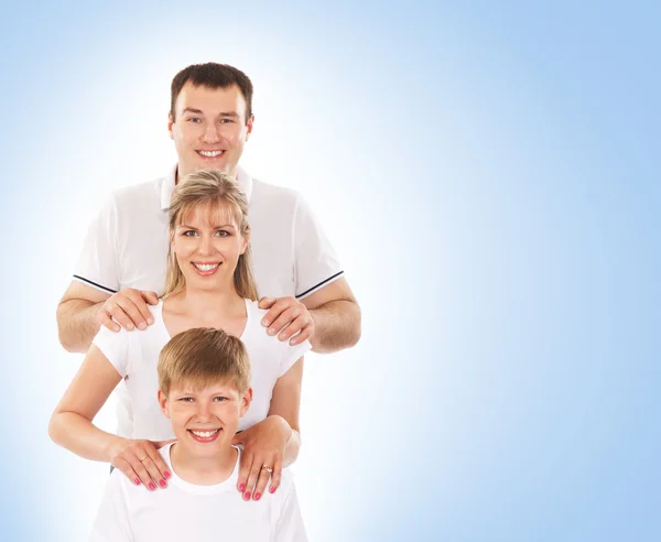 Happy family isolated over blue background