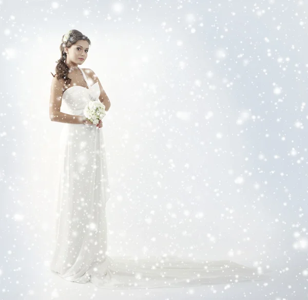 Bride with the bouquet of white roses