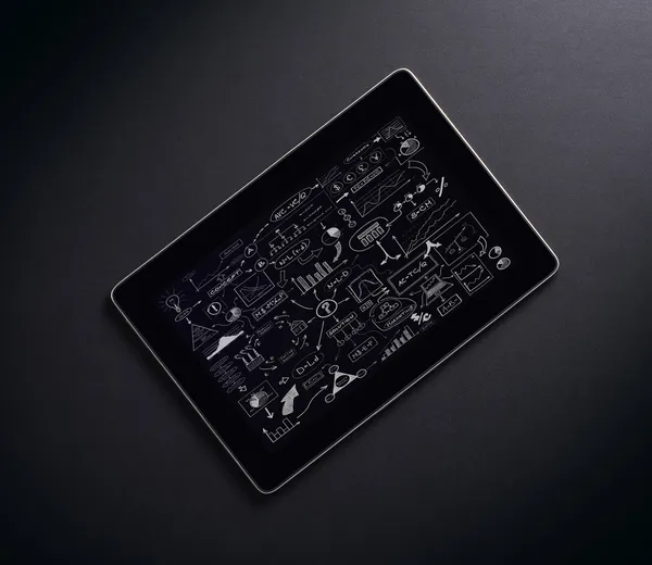 Tablet pc over the black background