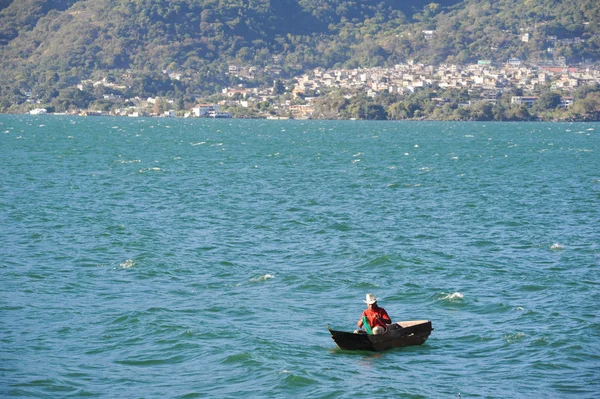 Fisherman with canoe
