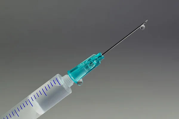 Droplet on the Point of Hypodermic Needle