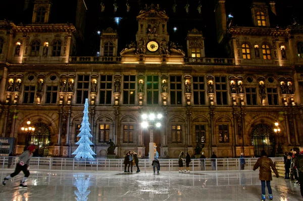 Skating-rink near the Hotel de ville at night in Paris.