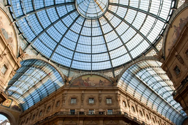 Glass dome of Galleria Vittorio Emanuele II shopping gallery. Milan, Italy