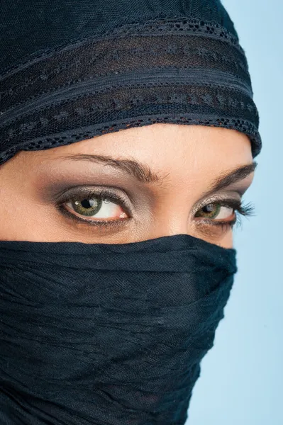 Portrait of veiled woman, focus on eyes