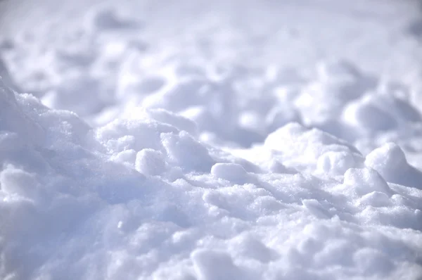 Effective blue snow background, very tiny focus