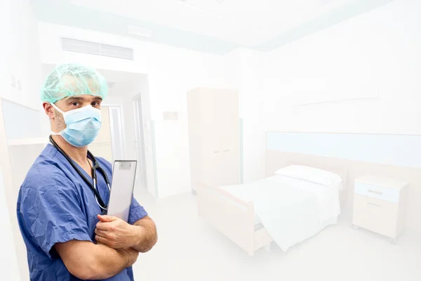 Doctor or nurse with surgical mask in bedroom background