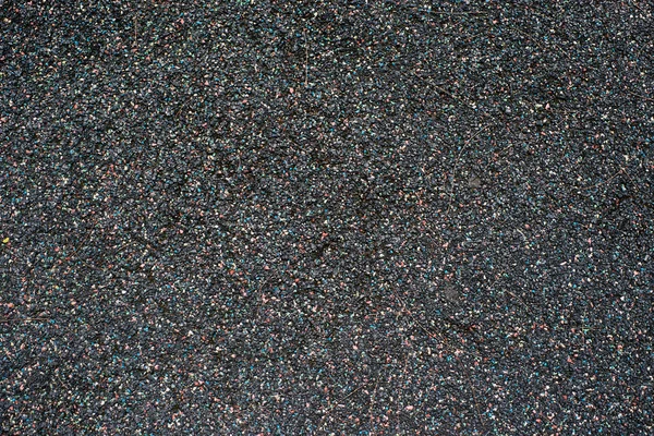 Black playground soft rubber surface