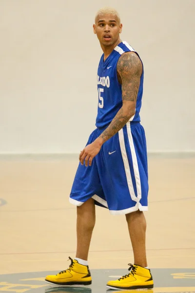 Chris Brown plays in the E League Celebrities Bridge Basketball and Charity event sponsored by Nike