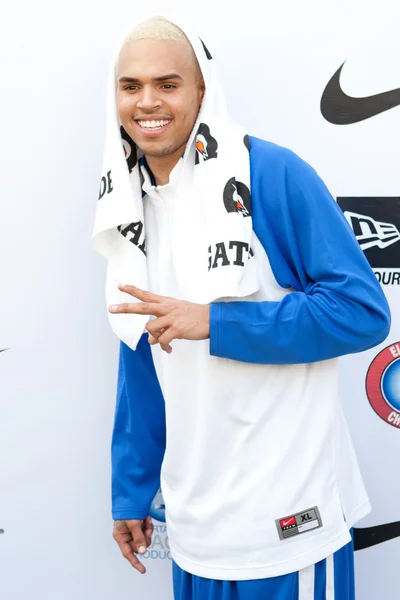 Chris Brown arrives at the E League Celebrities Bridge Basketball and Charity event sponsored by Nike