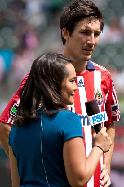 Sacha Kljestan being interviewed during half time of the match