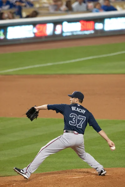 Brandon Beachy pitches during the game