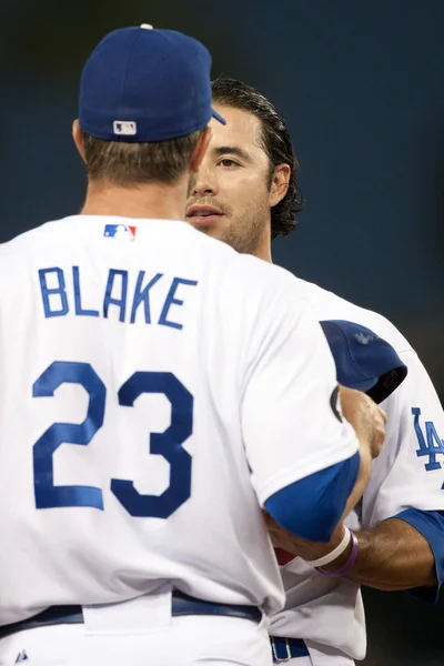 Andre Ethier as a quick chat with Casey Blake in between innings during the game