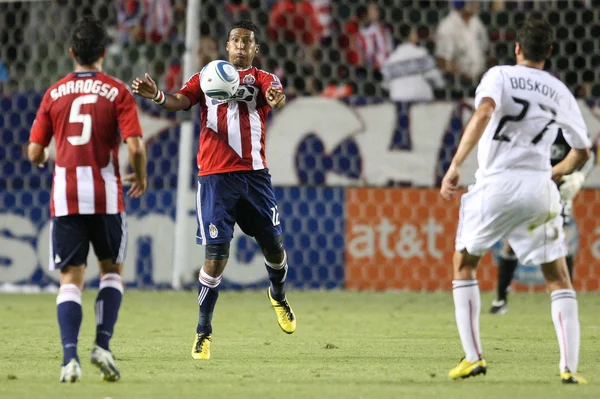 DARIO DELGADO cheast traps the ball during the Chivas USA vs DC United game