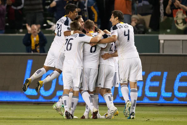 The Galaxy celebrate a goal scored off a free kick during the Major League Soccer game