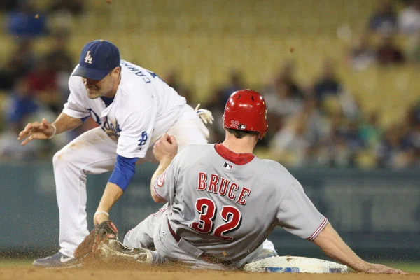 JAY BRUCE slides into second and tries to beat the tag by JAMEY CARROLL during the game