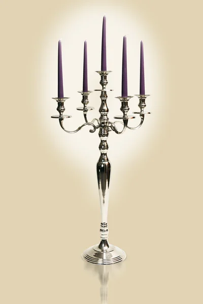 Traditional silver candelabra with 5 candles.