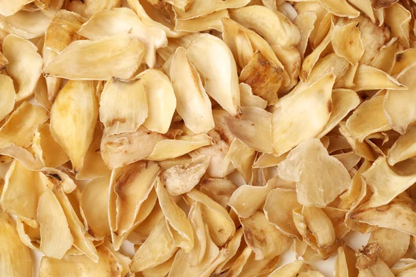 Dried lily bulbs, traditional chinese herbal medicine on white background