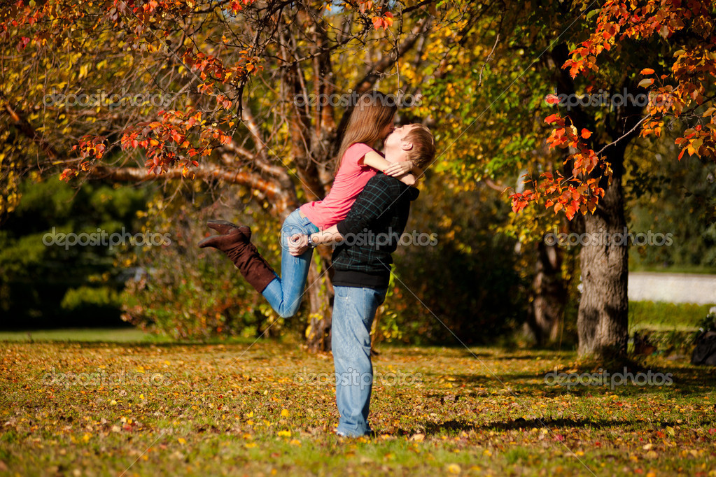 http://st.depositphotos.com/1822645/1764/i/950/depositphotos_17641467-Beautiful-couple-kissing-in-autumn.jpg