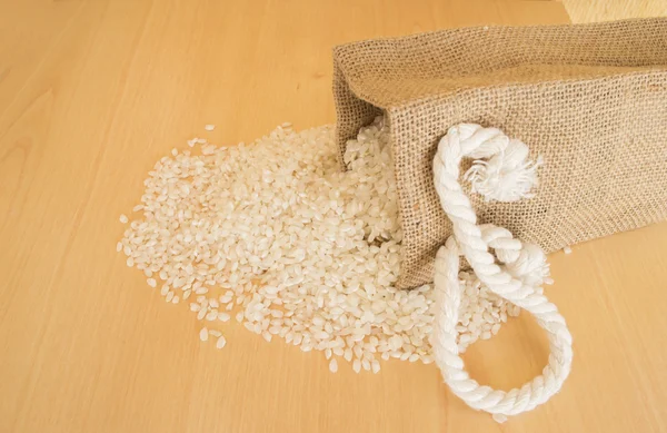 Pile of rice beans with wooden background