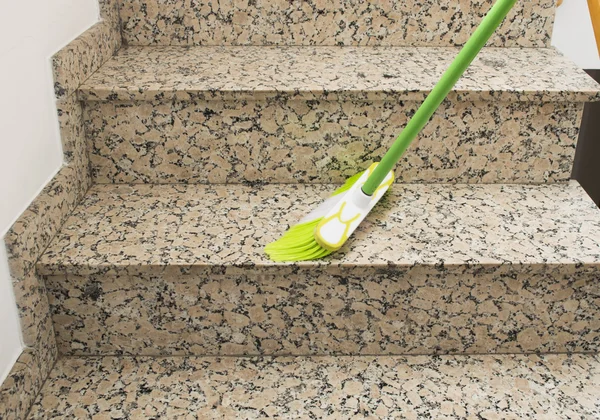 Brush cleaning the stairs marble