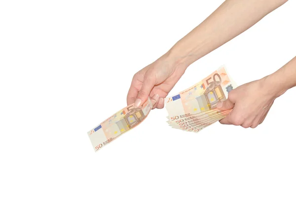 Woman pays or giving cash Euro banknotes