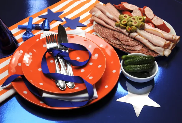 Football celebration party table setting in team colors.
