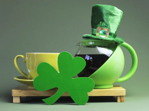 St Patrick\'s Day breakfast with green pot of tea, tea cup and saucer with shamrock