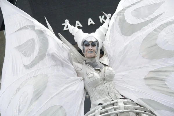 Close up of winged lady who is part of the street theater group Close-Act, Hoogeveen, Netherlands