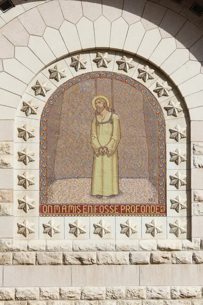 Mosaic depicting Jesus with noose around his neck to the outside wall of The Church of Saint Peter, Gallicantu, Israel