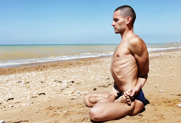 Man in meditation yoga pose