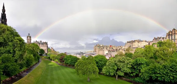 Rainbow over Princess street gardens in Edinburgh