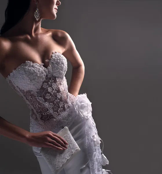 Luxe bride in form-fitting dress, catalog photo