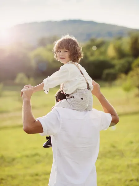 Father and son playing