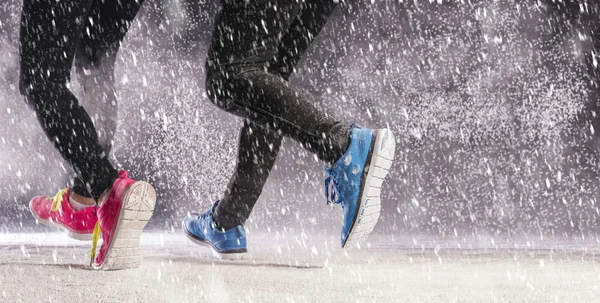 Couple running in winter