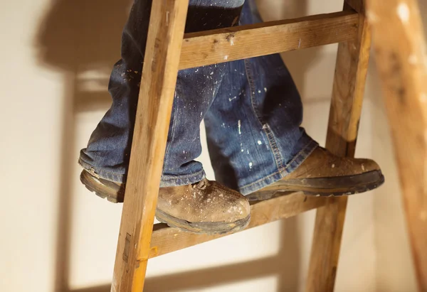 Man painting the walls