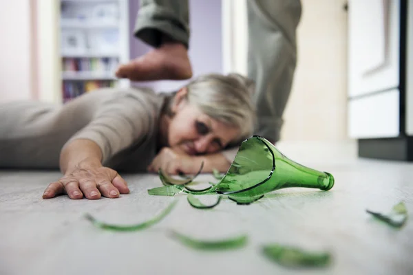 Woman scared of man with broken bottle