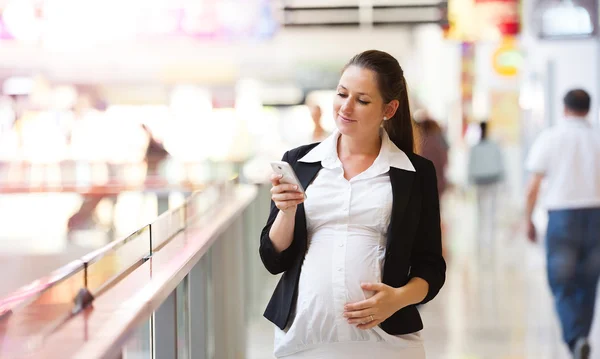 Woman typing message on phone