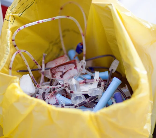 Discarded blood tubes and needles