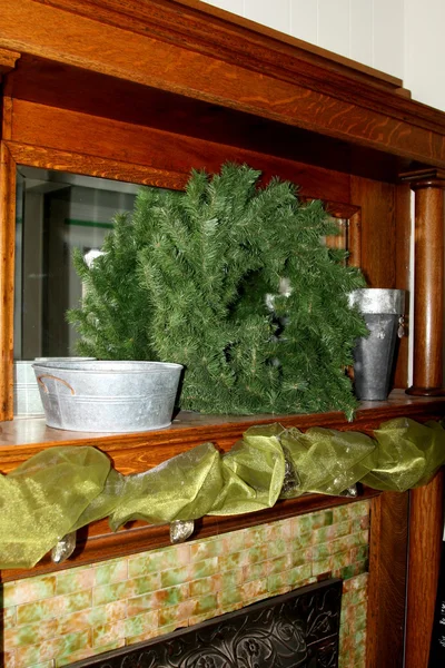 Fireplace mantel with wreath